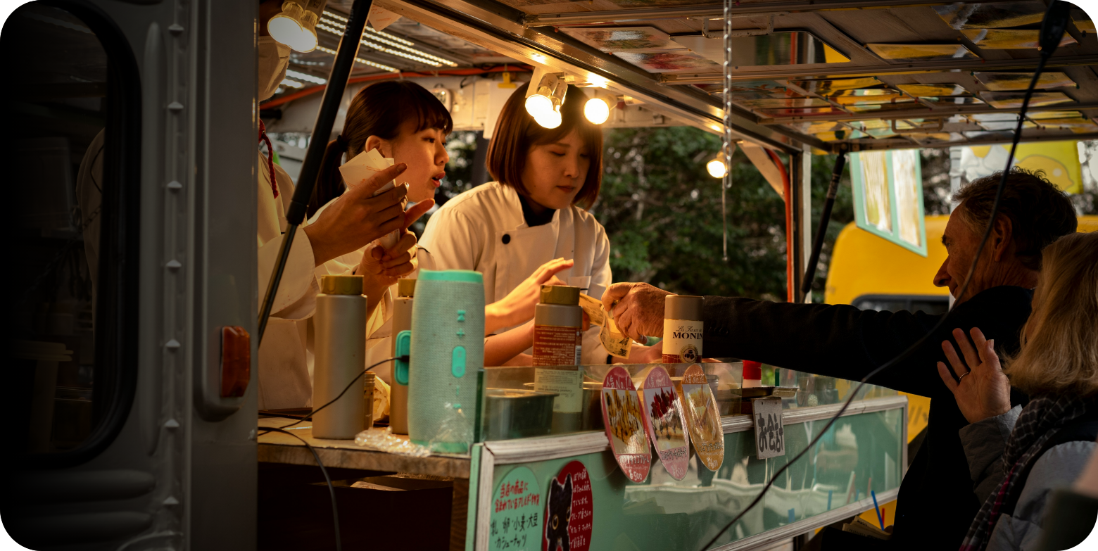 People ordering at a food truck